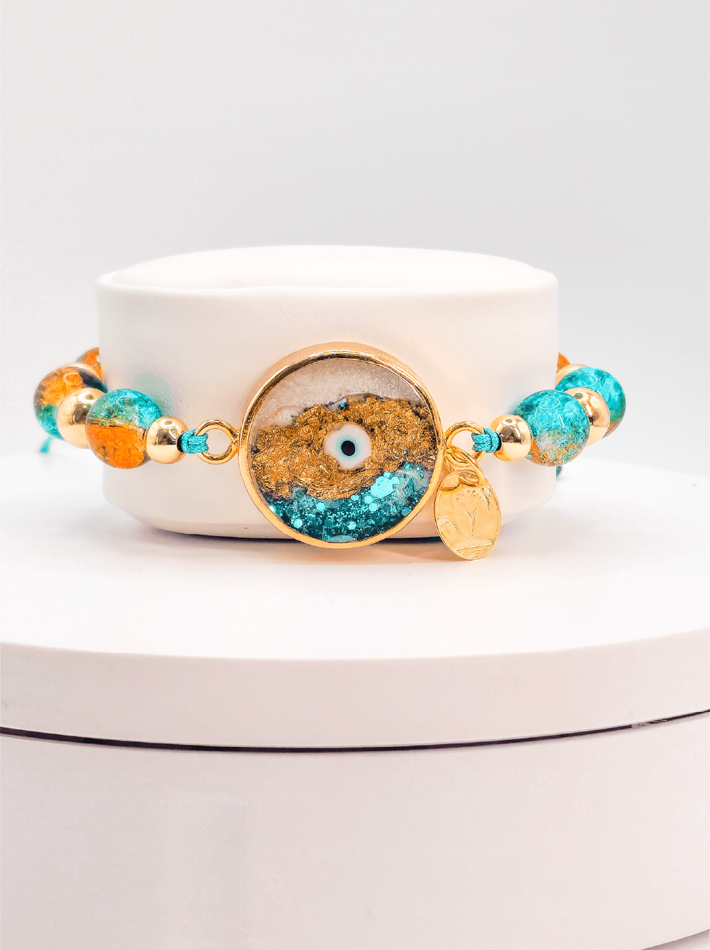 Pulsera Nazar Bocugu – Ojo turco artesanal, cuentas de resina y baño de oro